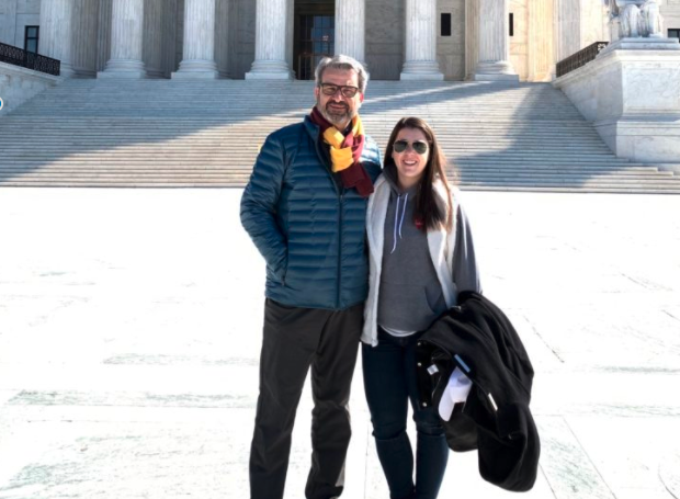 A proud father with his daughter who is also a lawyer.